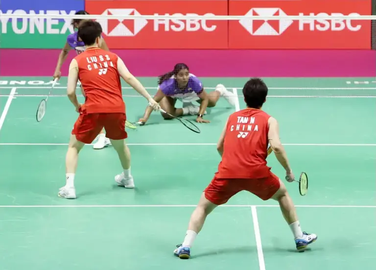 August 22, 2026, New Delhi, New Delhi, India: NEW DELHI, INDIA – AUGUST 22, 2026: India's Treesa Jolly and Gayatri Gopichand Pullela play a shot against China's Liu Sheng Shu and Tan Ning during their women's doubles semi-final match at the BWF World