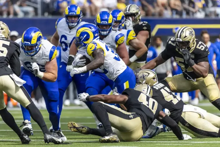 August 22, 2026, Inglewood, California, USA: Los Angeles Rams Running Back Jordan Waters (32) runs the ball fighting off pressure from New Orleans Saints during an NFL football preseason game, in Inglewood, Calif. on Saturday August 22, 2026. (Credit