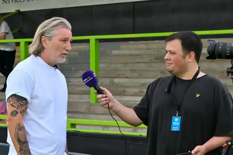 Forest Green Rovers First Team Manager Robbie Savage gives his pre-match interview to BBC Radio Gloucestershire during the National League match between Forest Green Rovers and FC Halifax Town at the The Bolt New Lawn, Forest Green, UK on 8 August 2