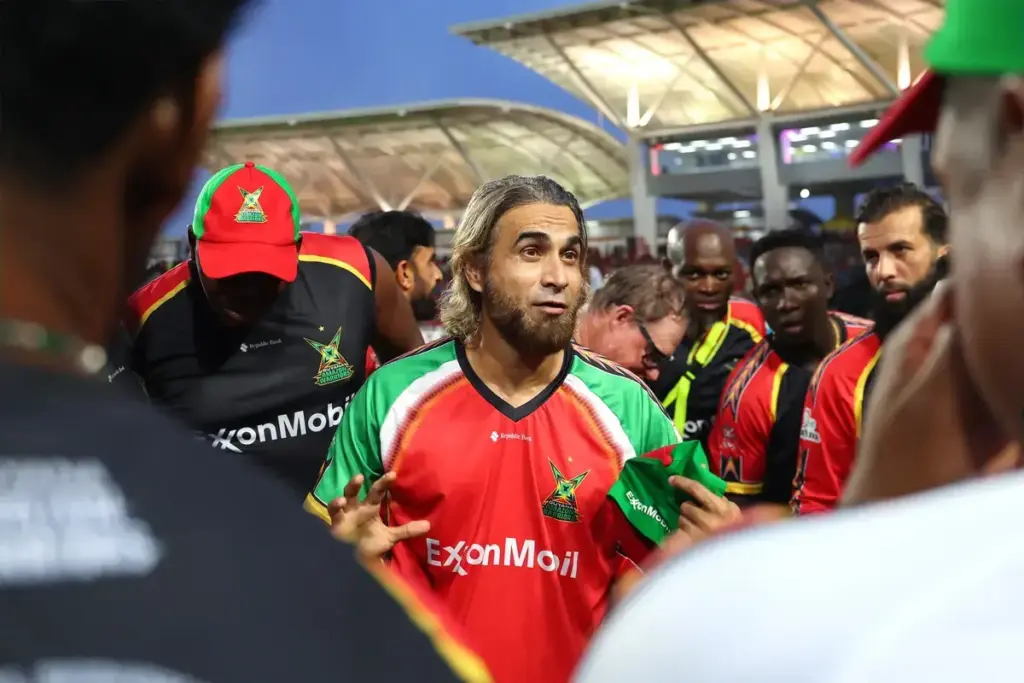 TAROUBA, TRINIDAD AND TOBAGO - AUGUST 30: Imran Khan, captain of Guyana Amazon Warriors gives a team-talk ahead of play during the Men's 2025 Republic Bank Caribbean Premier League match between Trinbago Knight Riders v Guyana Amazon Warriors at Bria