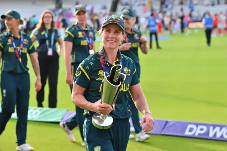 Australia win - Sophie Molineux of Australia celebrates with the trophy during the post match presentations during the ICC Women's T20 World Cup Final match between Australia Women and England Women Cricket at Lord's Cricket Ground, St John's Wood, U