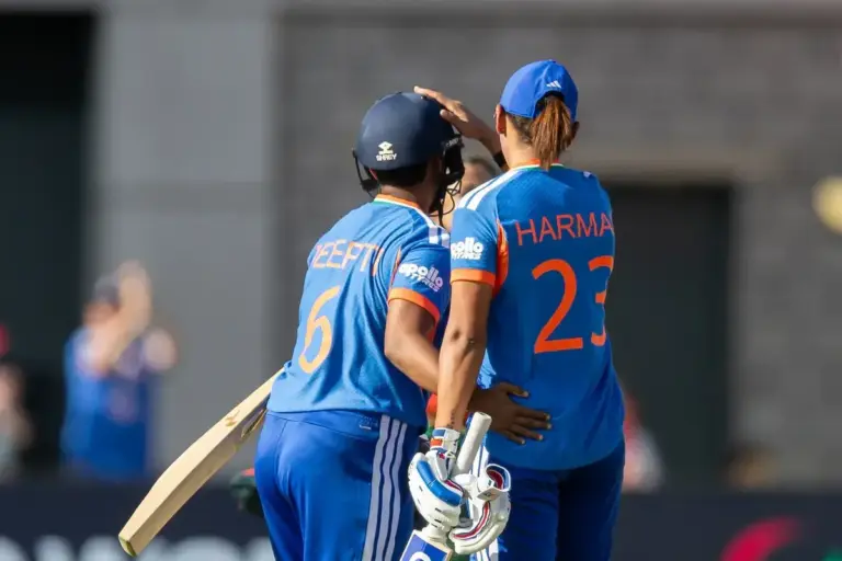 Deepti Sharma hits a SIX for the winning runs and gets pat on the head from India Women Harmanpreet Kaur (c) during the ICC Women's T20 World Cup match between India Women and Bangladesh Women at Old Trafford, Manchester, UK on 25 June 2026.