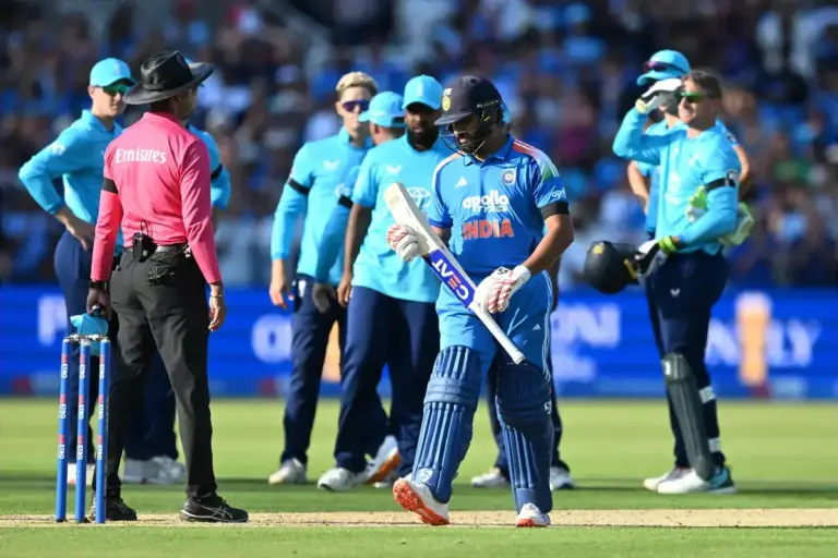 Wicket - Rohit Sharma of India looks dejected as he walks back to the pavilion after being dismissed by Jacob Bethell of England during the Metro Bank One Day International match between England and India at Lord's Cricket Ground, St John's Wood, UK