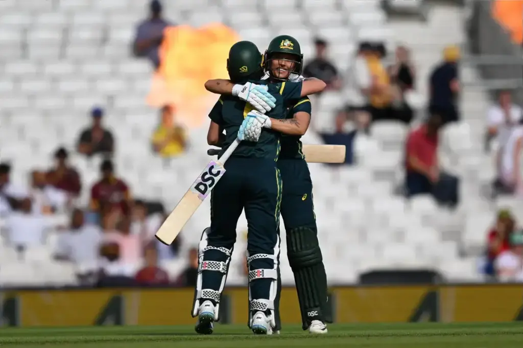 Australia win - Beth Mooney of Australia and Ashleigh Gardner of Australia celebrate chasing don the West Indies total during the ICC Women's T20 World Cup semi final match between Australia Women and West Indies Women at the Oval, London, UK on 30 J